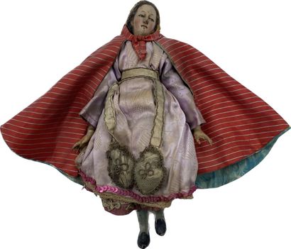 null Santon napolitain représentant une femme vêtue d'une robe mauve.
XIXe siècle
Long....