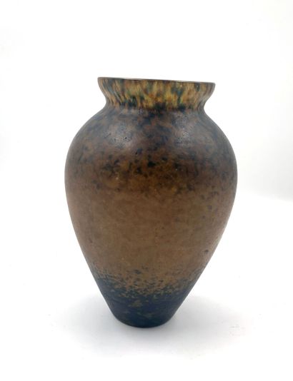 null Baluster vase with small hemmed neck in yellow and blue-green marbled glass....