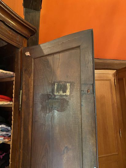 null LARGE MOLDED AND CARVED OAK ARMOIRE, opening with two doors and three drawers...