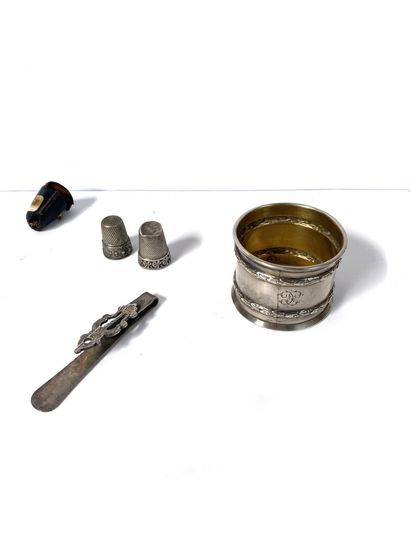 null Set of silver pieces including a napkin ring decorated with laurel garlands...