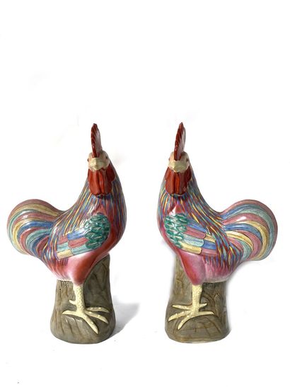 null CHINA
Two polychrome enameled ceramic figures of roosters. 
Height: 35 cm 