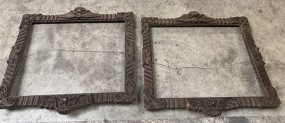 null TWO rectangular frames in natural wood carved with fluting, shells and interlacing....