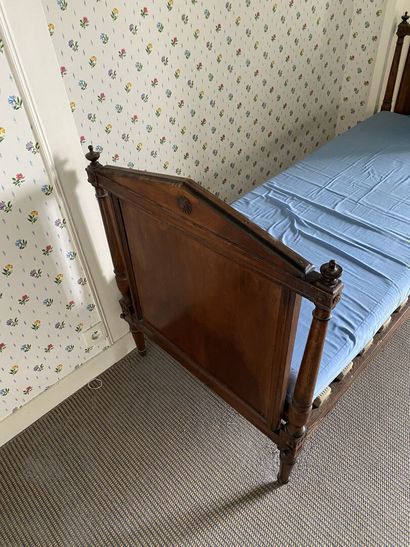 null Mahogany and mahogany veneer BED with pediment and detached columns. 
Directoire...