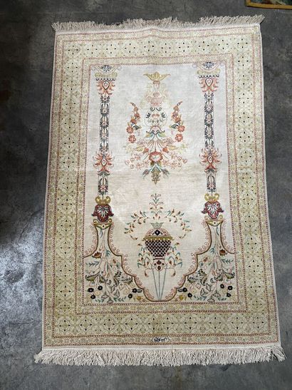 null CESAREE, 20th century 
Silk prayer rug with two columns framing a lamp on an...