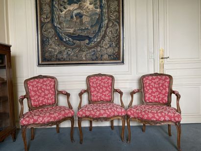 null FOUR cabriolet armchairs in molded and carved natural wood, decorated with flowers,...