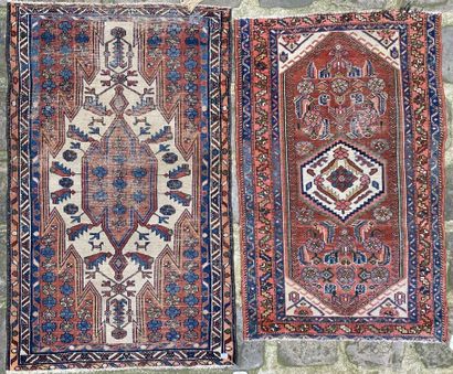 null MALAYER
Two small carpets with stylized geometric designs. 
126 x 79 cm and...