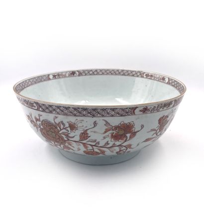 null China
Circular porcelain bowl decorated in iron red and gold with peonies and...