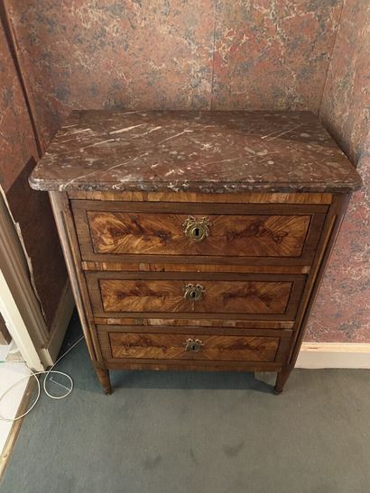 null SMALL COMMODE in veneered wood opening to three drawers in butterfly wing marquetry,...