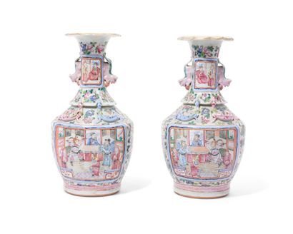 null China
Pair of baluster-shaped porcelain vases with polychrome decoration in...