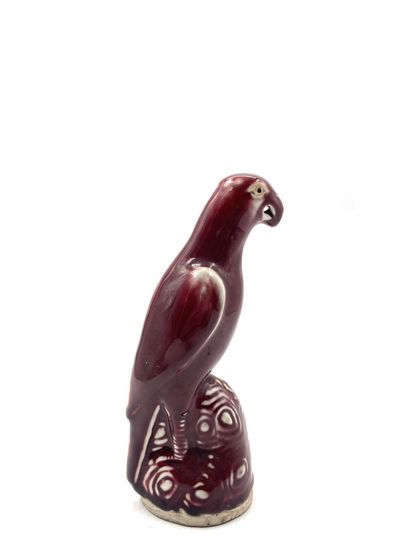 null CHINA, early 20th century 
Porcelain parrot with oxblood enamel. 
Height: 24...