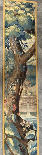 null AUBUSSON
Wool tapestry featuring a tree trunk and a fountain. 
187 x 41 cm 
