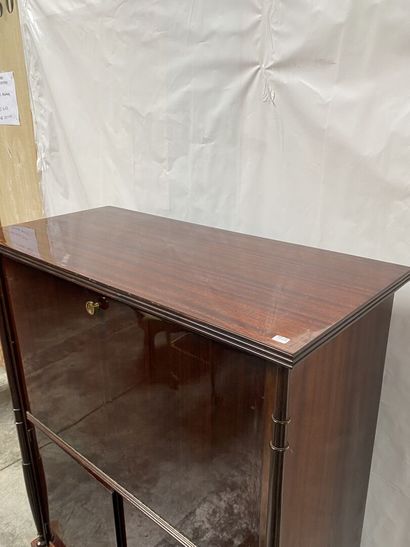 null Wood veneer BAR CABINET opening to two doors in the lower part and a flap in...
