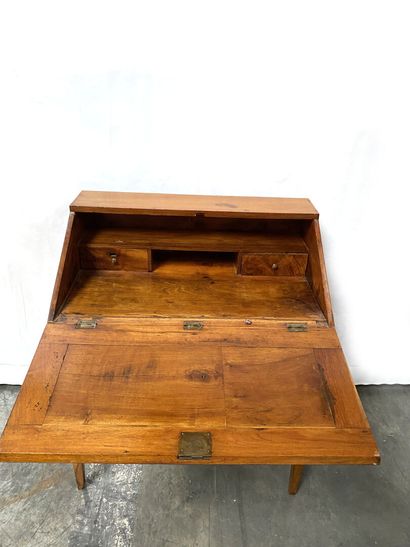 null LITTLE HANGING DESK in natural wood opening to a drawer in the waist, and a...
