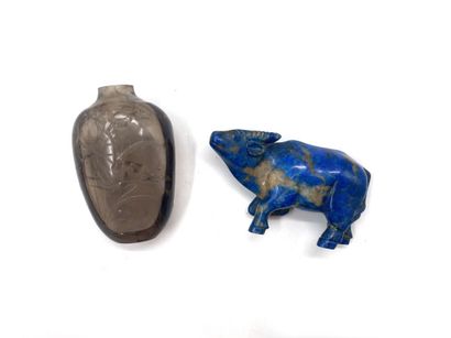 null SMALL lapis lazuli SUBJECT depicting an ox.
Height 4 cm, length 7.5 cm 
Accident...