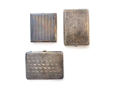 null THREE SILVER CIGAR HOLDERS: 
- Rectangular cigarette case in silver 800/1000...