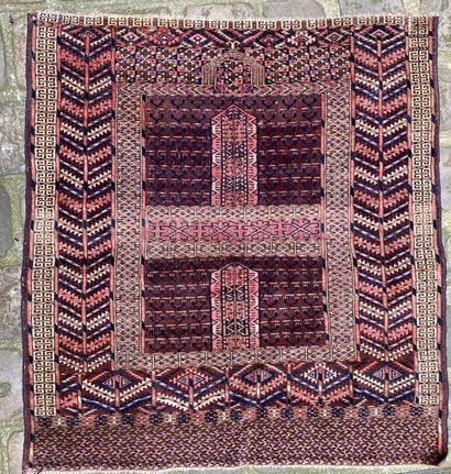 null HATCHLOU, 19th century 
Carpet decorated with four squares and a mihrab on a...