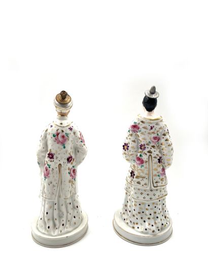 null PARIS
Pair of porcelain perfume bottles featuring a standing oriental couple...