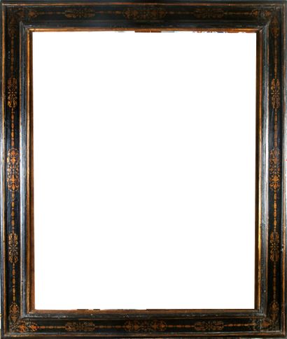 null Rectangular frame in black lacquered wood, decorated with gilded foliage and...