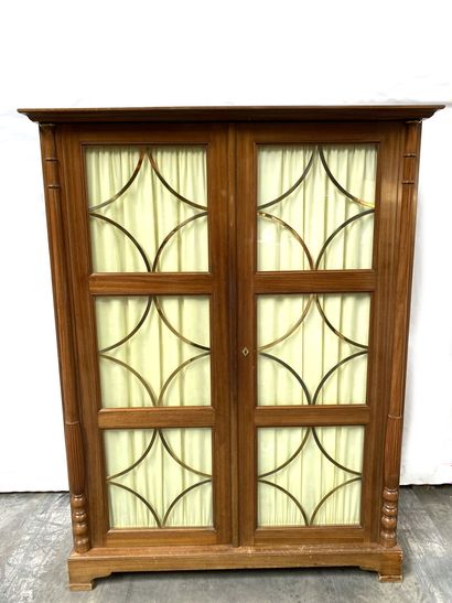 null Mahogany and mahogany veneer LIBRARY opening to two glass doors decorated with...