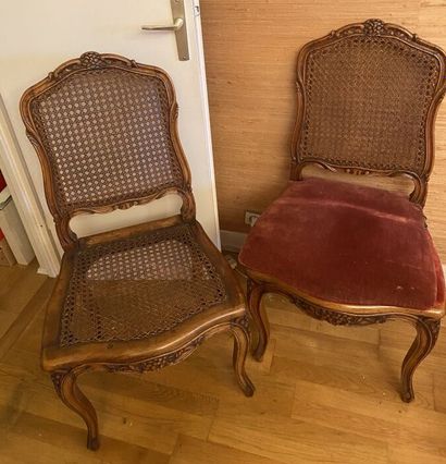 null TWO CHAIRS in natural wood, molded and carved with foliage and staples, caned...