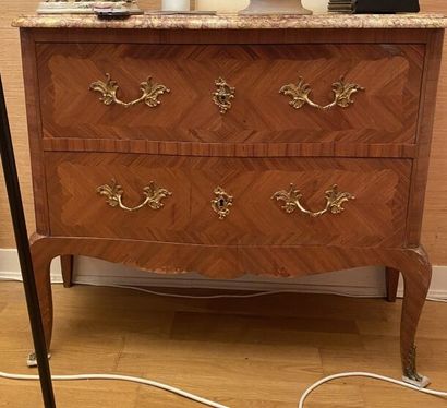 null WOODEN VENEER COMMODE opening to two drawers and resting on curved legs, the...