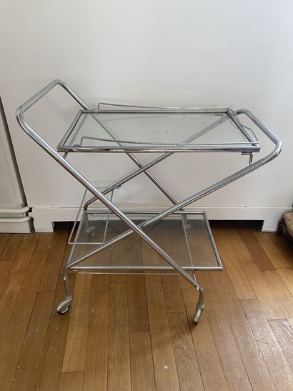 null DESSERTE chrome-plated metal bar on casters with two glass tops. 
20th century...