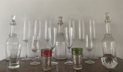 null Mismatched glass and crystal services including 6 large flutes, 3 carafes, 2...