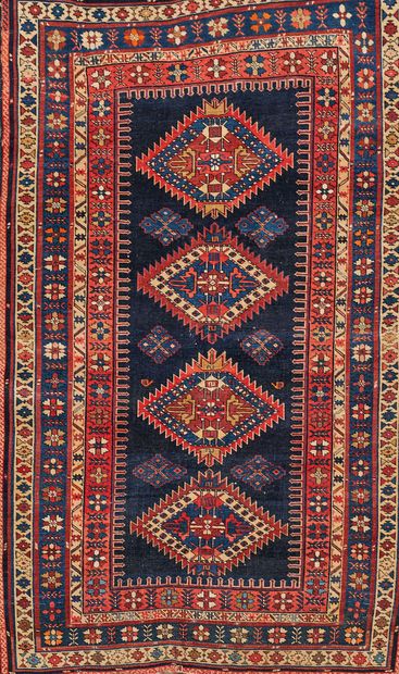 null CHIRVAN, 19th century
Carpet decorated with three crenellated lozenges surrounded...