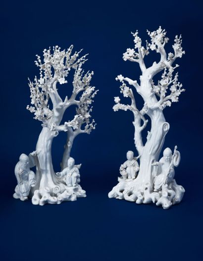 null CHINA
Two Blanc-de-Chine porcelain groups of two prunus trees in bloom, Shoulao...