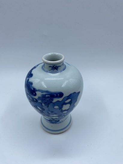null China
Porcelain baluster vase with blue underglaze decoration of a woman and...