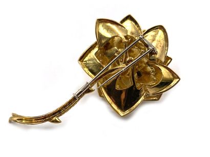 null Engraved 750 thousandths yellow gold lapel clip featuring a rose, the petals...
