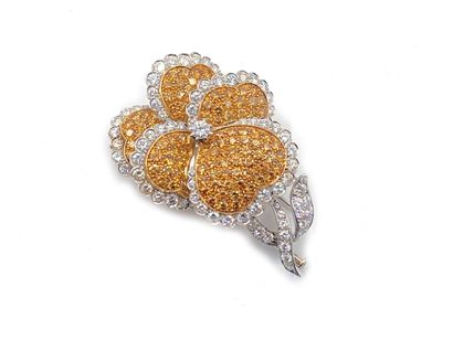 null 750 thousandth white gold lapel clip featuring a flower entirely set with round...