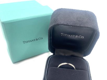 null TIFFANY & CO.
Wedding band in 950 thousandth platinum, the center set with a...