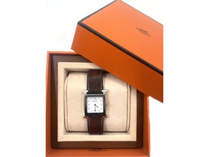 null HERMES
H. TIME REF. HH1.510.
Steel bracelet watch on leather.
CASE: H-shaped,...