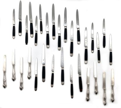 null Eight 950 thousandths silver fruit knives decorated with shells and flowering...