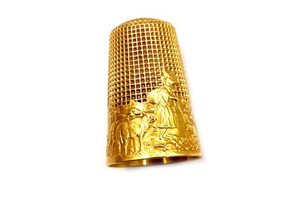 null Engraved 750 thousandths yellow gold thimble. 
Gross weight: 7.4 g
(Wear)
