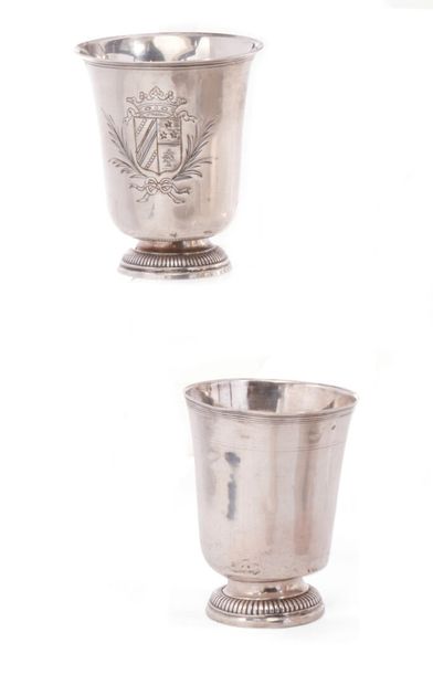 null Two plain silver tulip-shaped kettledrums, threaded necks, standing on a gadrooned...