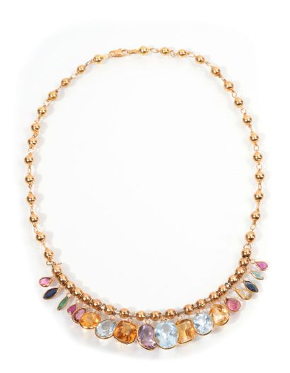 null Articulated necklace in 750 thousandths yellow gold decorated with gold balls,...