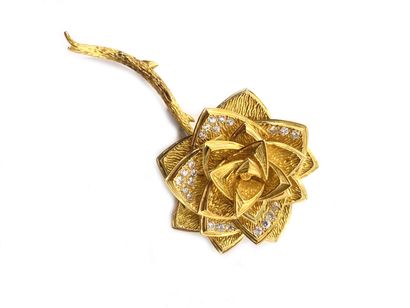 null Engraved 750 thousandths yellow gold lapel clip featuring a rose, the petals...