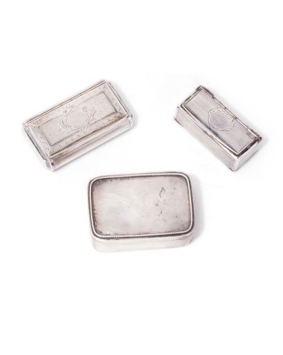 null A rectangular box and two snuffboxes in plain 950 thousandths silver with cartouche...