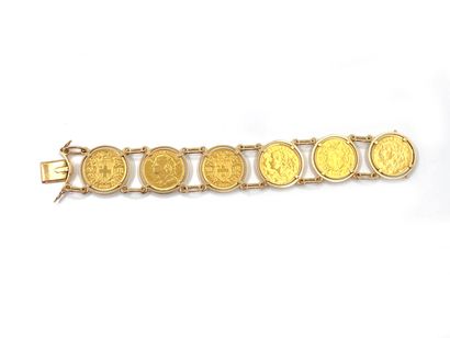 null Bracelet articulé en or jaune 750 millièmes, les maillons ornés de pièces en...