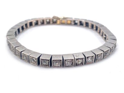 null Articulated bracelet in 800 thousandths silver and 750 thousandths gold adorned...