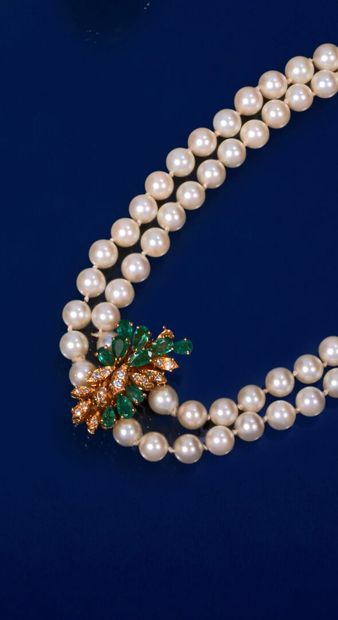 null Two-row necklace of fifty-two and fifty-five choker cultured pearls, the clasp...
