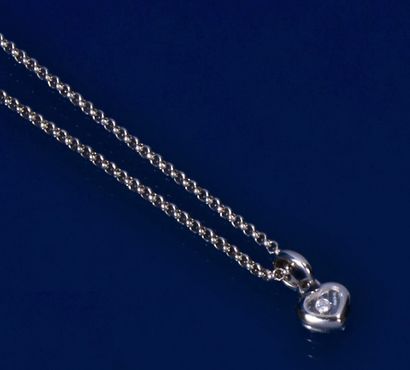 null CHOPARD
Articulated necklace, the round links supporting a pendant heart motif,...