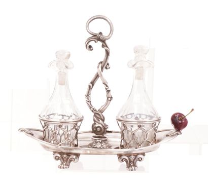null Oil cruet set in 950 thousandths silver, standing on an oval basin with quatrefoil...