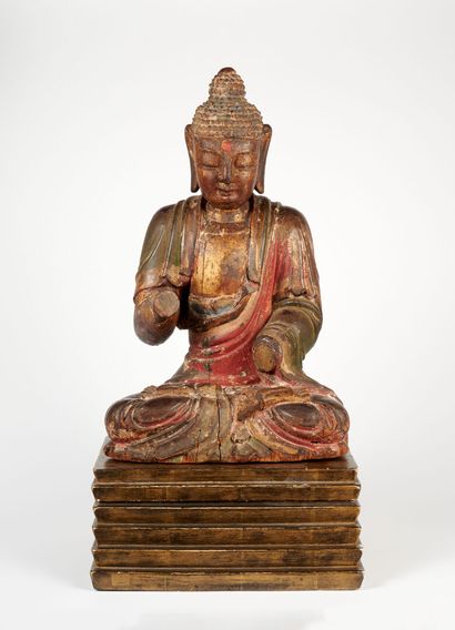 null CHINA - MING Dynasty (1368 - 1644)
Wooden Buddha statuette with traces of polychrome...