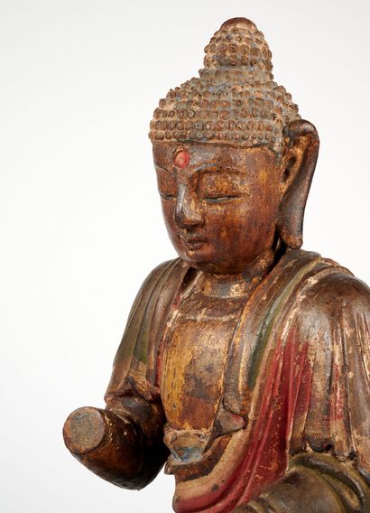 null CHINA - MING Dynasty (1368 - 1644)
Wooden Buddha statuette with traces of polychrome...