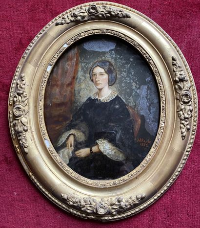 null ECOLE FRANCAISE du XIXe siècle
Portrait de femme en deuil.
Fixé sous verre signé...