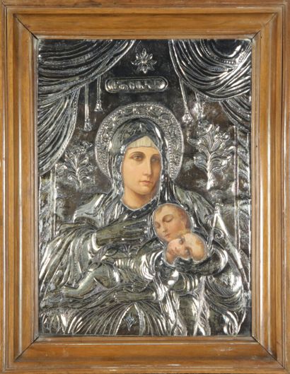 null Icône figurant la Vierge à l'enfant sur Rizza argenté. 
37 x 27 cm 
