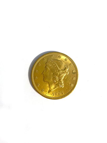 Pièce en or de 20 dollars, 1904. 
Poids :...
